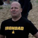 Iron Dad - Neil Biles grimaces in his Iron Dad T-Shirt